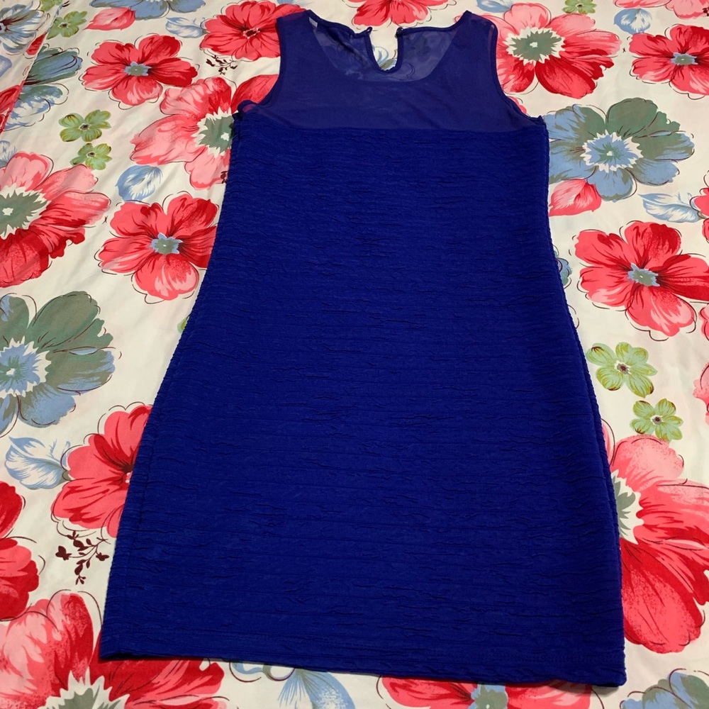 Blue sleeveless dress.